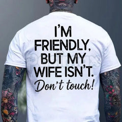 "I'm Friendly But My Wife Isn't" Funny Warning T-Shirt - Sarcastic Marriage Humor Graphic Tee, Premium 100% Cotton Husband Top, Hilarious Warning Label Style Shirt, Unique Anniversary or Father's Day Gift, Soft Lived-In Casual Apparel